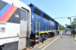 This is a side, rear view of the 4109. The circle on the far left of the locomotive is the NJ Department of Transportation logo.